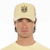 CULT OF INDIVIDUALITY Clean Logo Mesh Back Trucker in Banana at Gravity NYC